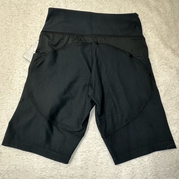 UFC Women's Black Bike Shorts with Red Logo and Side Pockets - Picture 7 of 12